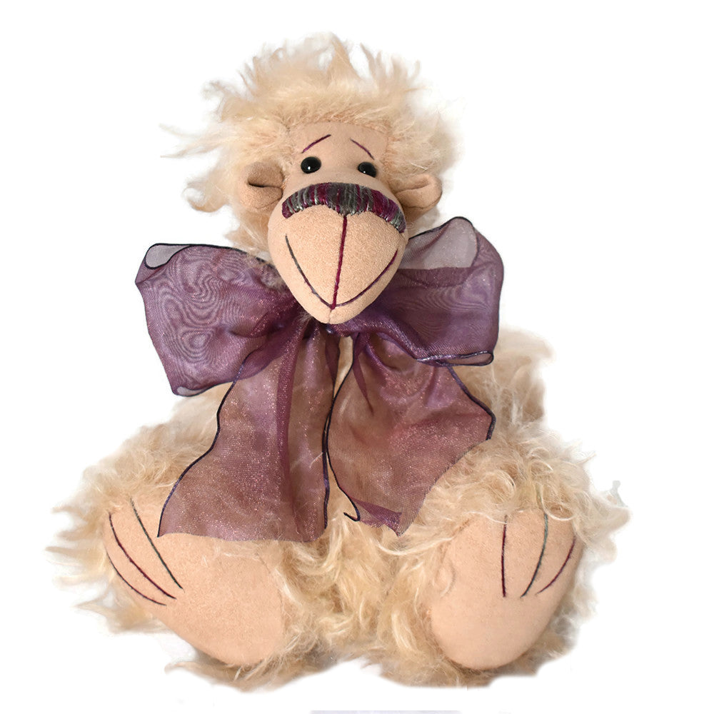 Peach Steiff Schulte teddy bear with purple organza bow