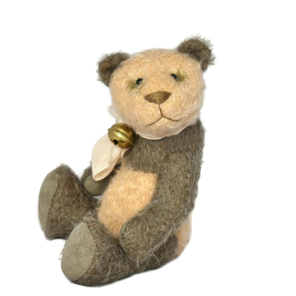 Collectable pand teddy bear in green and peach