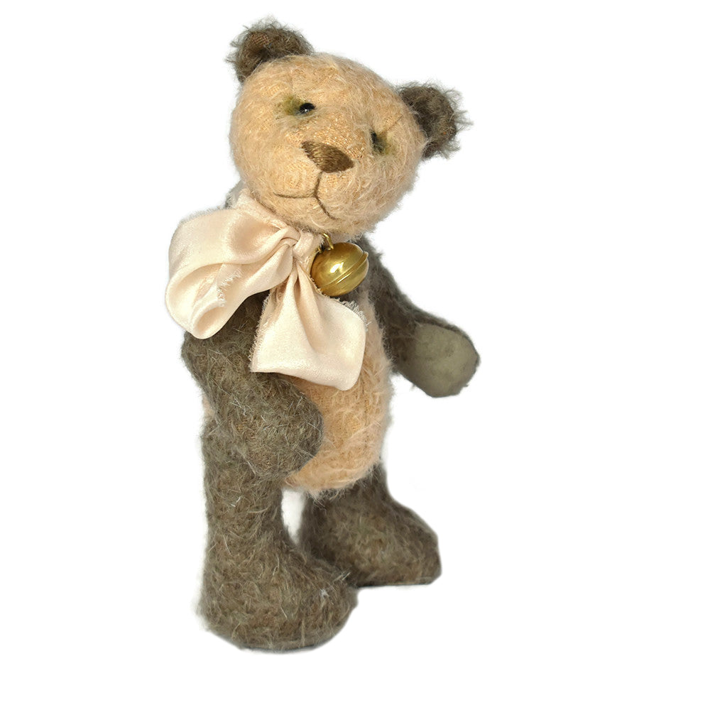 Green and peach panda with ivory ribbon and bell