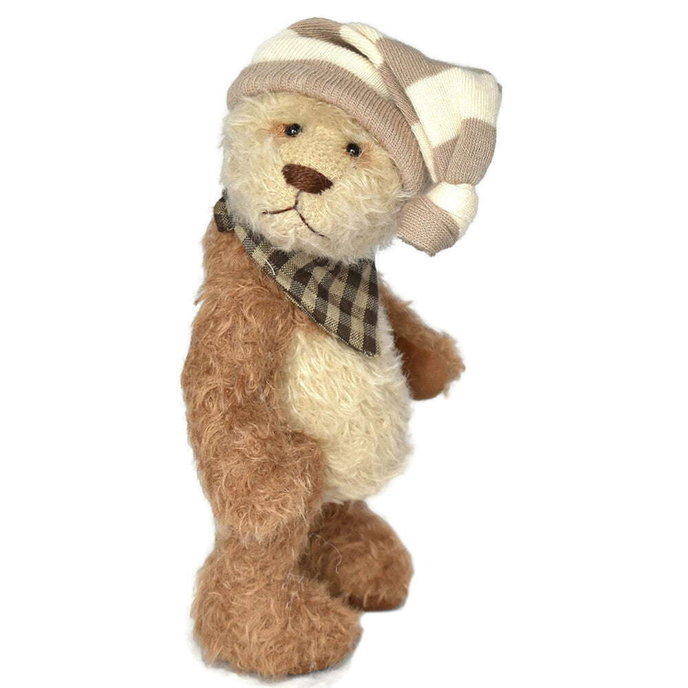 Collectable cream and brown panda bear
