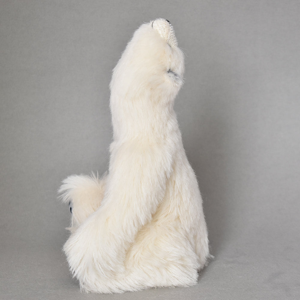 Handmade polar bear in Alpaca nose in the air