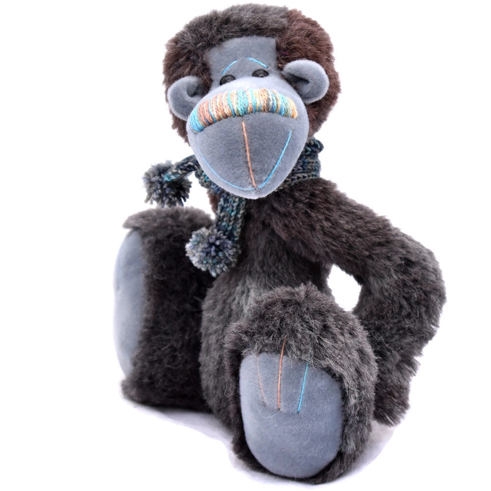 Black and grey alpaca bear sitting