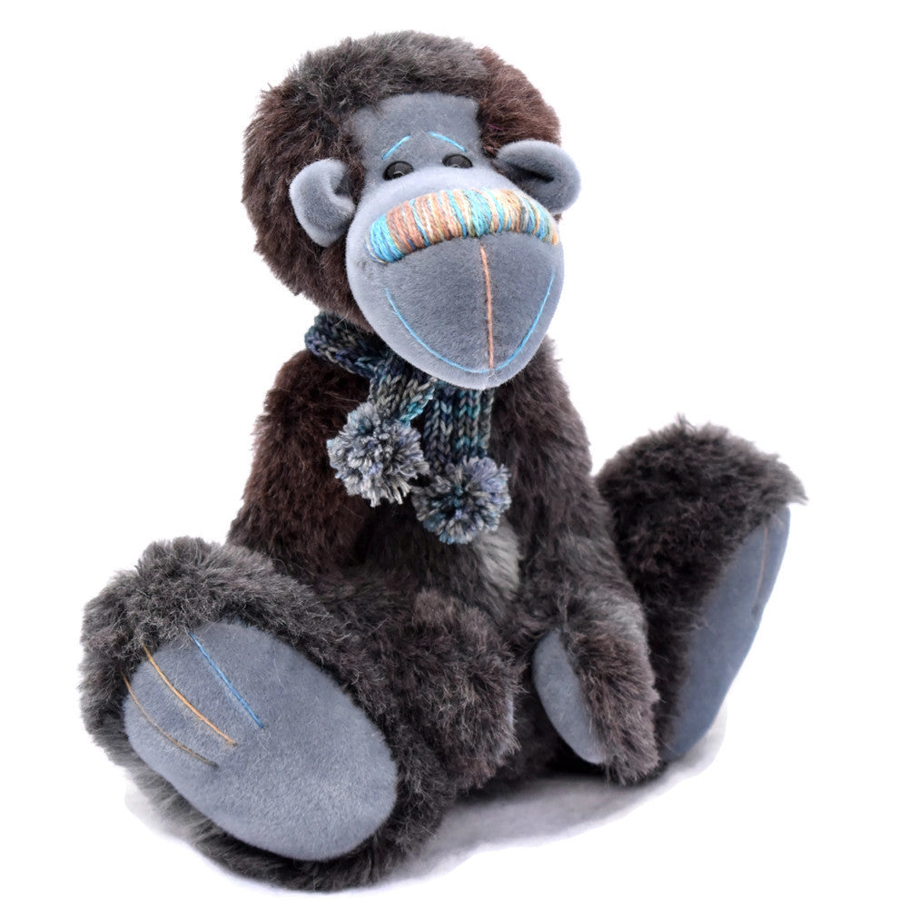 Black and grey alpaca bear sitting