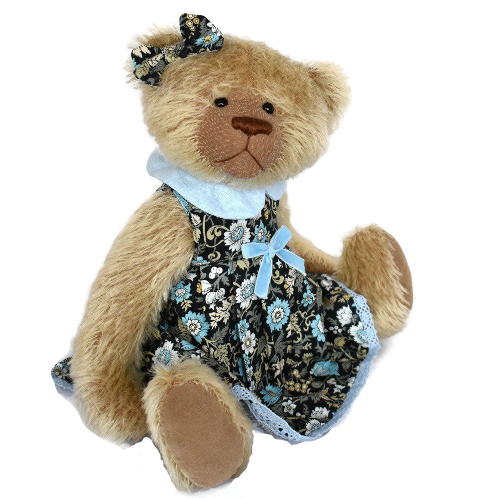 Handmade beige jointed teddy bear