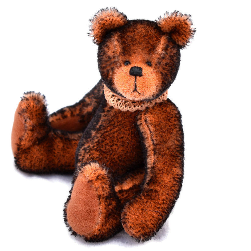 Miniature tipped mohair teddy bear sitting